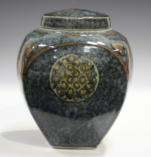 A David Frith studio pottery jar and cover of high-shouldered form, the mottled blue ground decorate