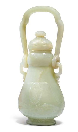 A FINE LIGHT CELADON JADE VASE AND COVER. China, 18th c. Height 21 cm.