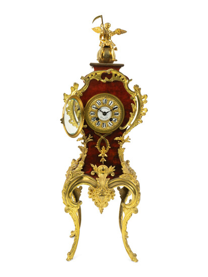 A French Gilt Bronze Mounted Tortoiseshell Veneered Clock