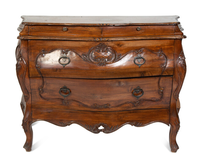 A French Provincial Style Carved Walnut Bombe Commode