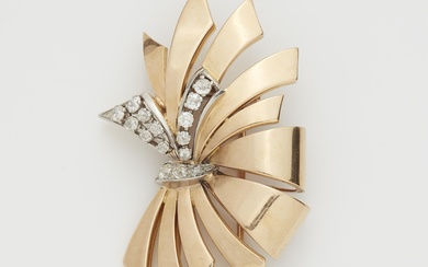 A French Retro Style 18k gold platinum and diamond bow clip brooch.