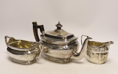 A George III engraved silver teapot and sugar bowl, by Andre...