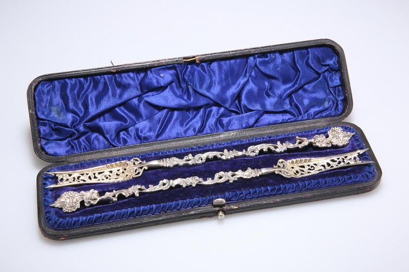 A PAIR OF VICTORIAN SILVER PICKLE FORKS, by
