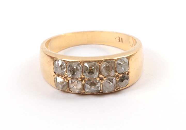 A Late 19th Century Two Row Diamond Ring, the old...