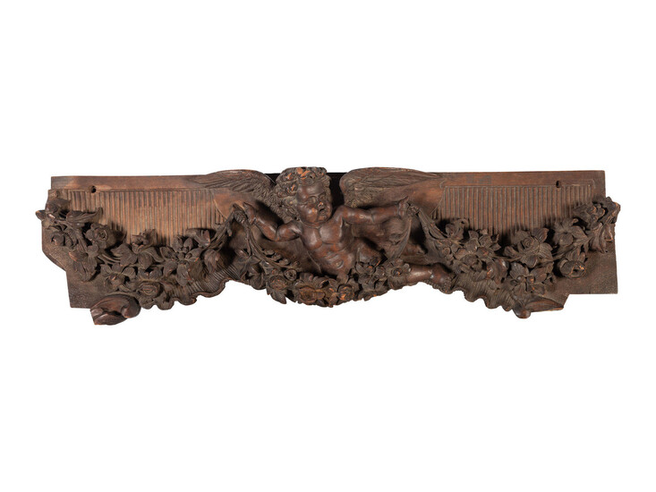 A Louis XV Style Cherub Carved Walnut Pediment
