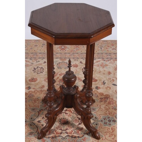 A MAHOGANY OCCASIONAL TABLE of octagonal outline the shaped ...