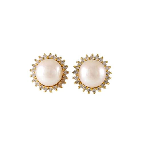 A PAIR OF CULTURED PEARL EARRINGS, with diamond surrounds