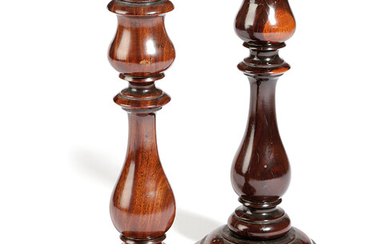 A PAIR OF EARLY VICTORIAN TREEN LIGNUM VITAE CANDLESTICKS