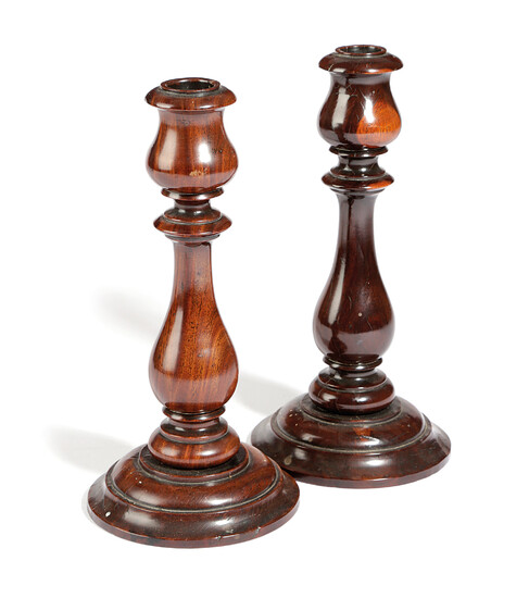 A PAIR OF EARLY VICTORIAN TREEN LIGNUM VITAE CANDLESTICKS