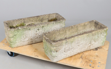 A PAIR OF RECONSTITUTED STONE TROUGH PLANTERS.