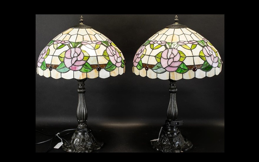 A Pair Of Reproduction Tiffany Style Table Lamps each raised...
