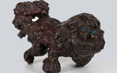 A Rootwood Lion Form Paperweight, Qing Dynasty.