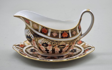 A Royal Crown Derby Imari sauce boat and stand. ...