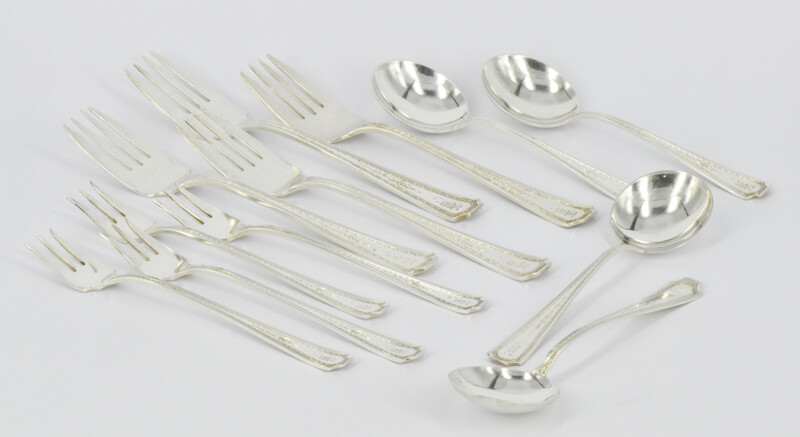 A SET OF FOUR STERLING SILVER PAUL REVERE REPRODUCTION BY TOWLE CAKE FORKS