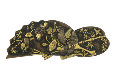 A Shakudo brooch, with crane motif.