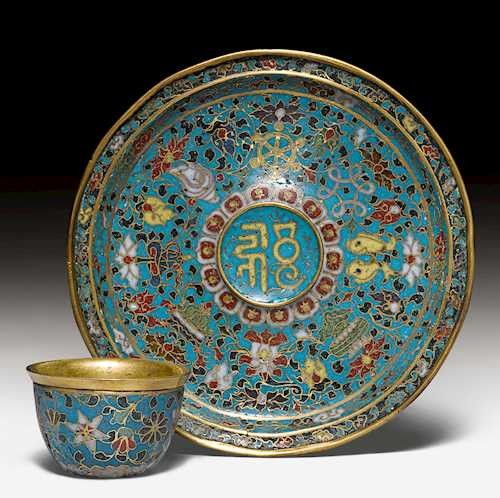 A TURQUOISE-GROUND CLOISONNE ENAMEL CUP AND SAUCER.