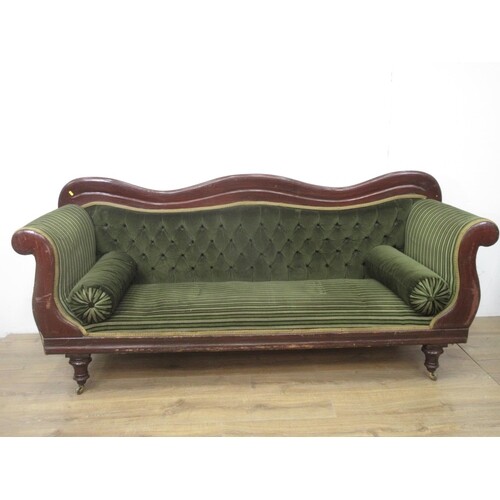 A Victorian button upholstered Settee with shaped back, scro...