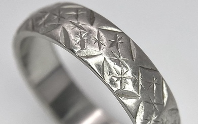 A Vintage Platinum Band Ring with Geometric Decorative Pattern....