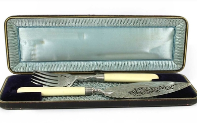 A cased pair of fish servers