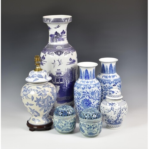 A collection of Oriental blue & white vases etc, comprising ...
