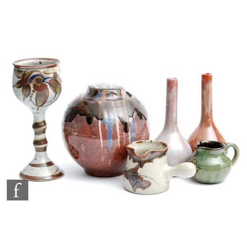 A collection of assorted studio pottery comprising a pair of...