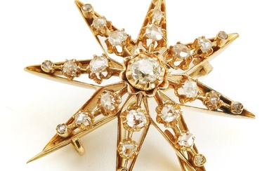 A diamond brooch in the shape of a star set with numerous old and rose-cut diamonds weighing a total of app. 1.05 ct., mounted in 14k gold. L. app. 3.5 cm. Circa 1900.