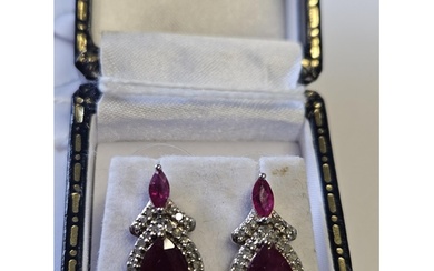 A good pair of 18ct Gold, Diamond and Ruby drop Earrings.