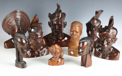 A group of 20th century Balinese carved wooden busts, mainly modelled wearing traditional headwear
