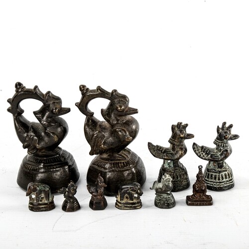 A group of Indian bronze weights, comprising pair of weights...