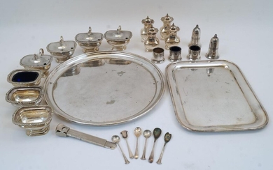 A group of silver plate, comprising: a circular tray, 35cm dia.; four mustard pots having covers with urn finials; four pepperettes, with three missing blue glass liners; two salt-cellars; three open salts with gadrooned rims and stepped bases, two...