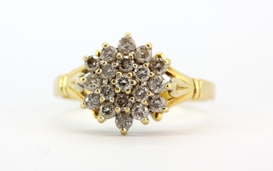 A hallmarked 18ct yellow gold diamond set cluster ring, approx. 0.50ct diamonds, (N).