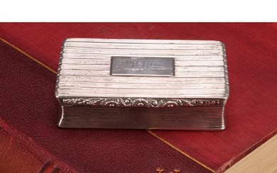 A large William IV silver waisted rectangular snuff box, ree...