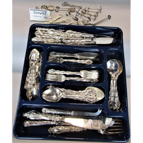 A large collection of silver plated fancy handled cutlery, t...