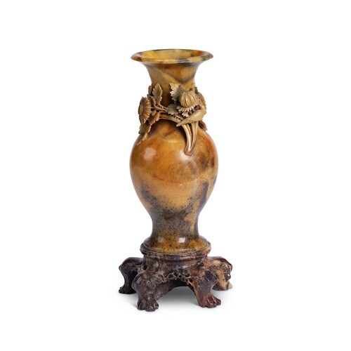 A large early 20th century carved soapstone vase Of baluster...