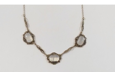 A moonstone and marcasite set necklace stamped 'STERLING', a...