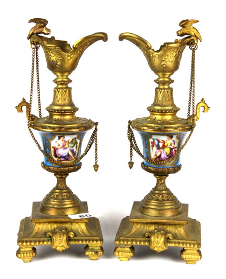 A pair of 19th Century French porcelain and gilt bronze garnitures, H. 28cm.