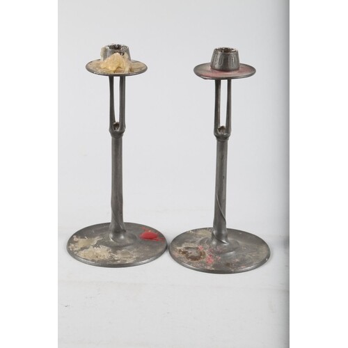 A pair of Art Nouveau pewter pillar candlesticks, by Connell...