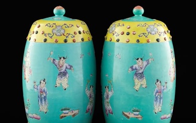 A pair of Chinese turquoise-glazed famille rose 'hundred boys' lidded jars, Republic period