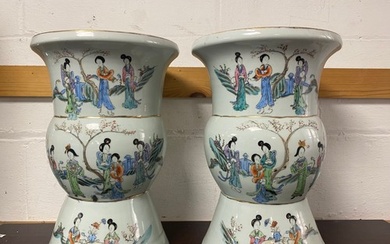 A pair of Chinese vases, each with banded decoration