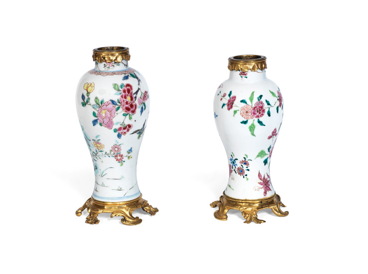 A pair of Louis XV gilt bronze mounted matched Chinese famille rose porcelain garniture vases