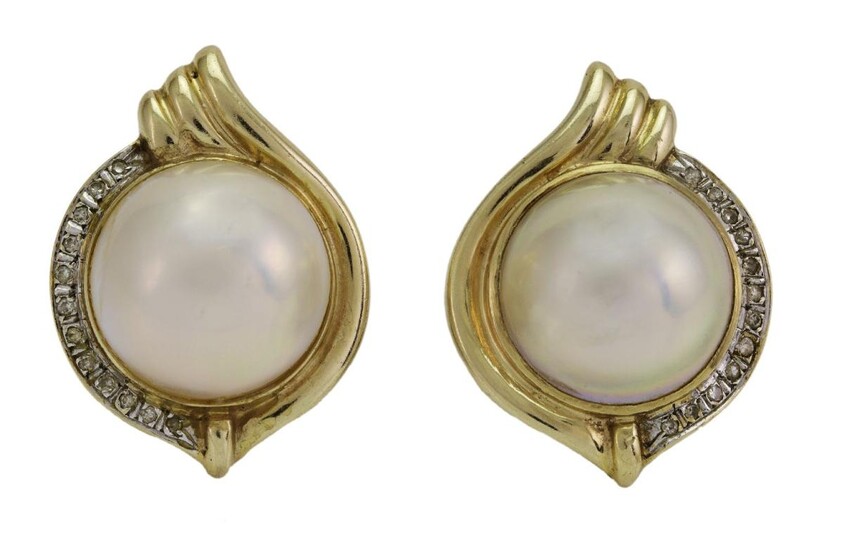 A pair of cultured mabe pearl and diamond earclips, each centring on a mabe pearl to a surround accented with single-cut diamonds, clip fittings.