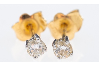 A pair of diamond solitaire earrings, brilliant cut diamonds...