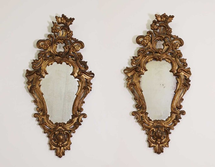 A pair of rococo wall mirrors