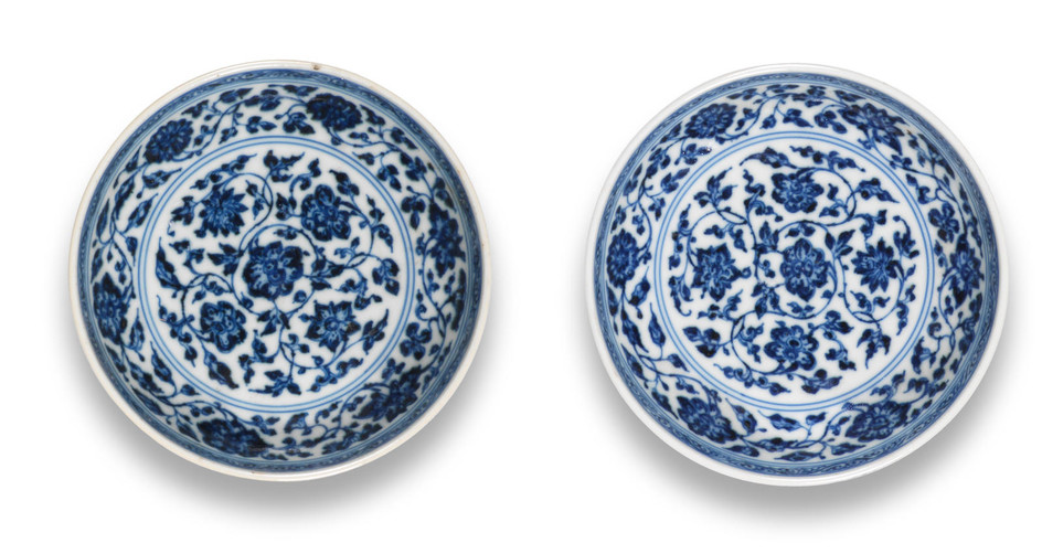 A rare pair of Ming-style blue and white saucer-dishes