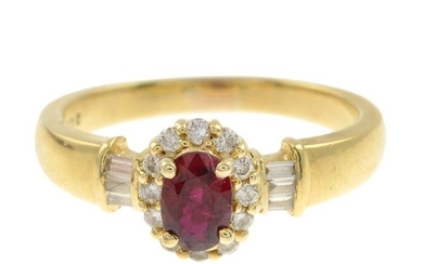 A ruby and diamond cluster ring.Ruby weight 0.58ct.Total...