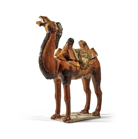 A sancai-glazed pottery figure of a camel, Tang dynasty | 唐 三彩駱駝