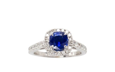 A sapphire, diamond and 14k white gold ring