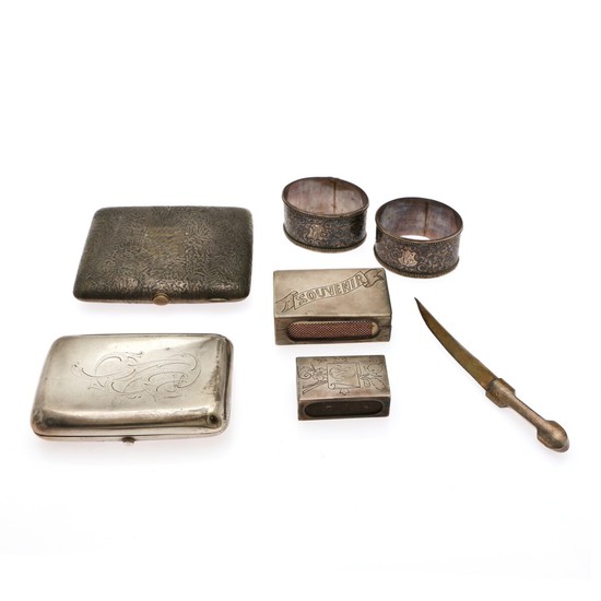 A small collection of Russian silver and a Finnish Samorodok silver cigarette case. 19th-20th century. Weight 325 g. L. 4.5–12 cm. (7).