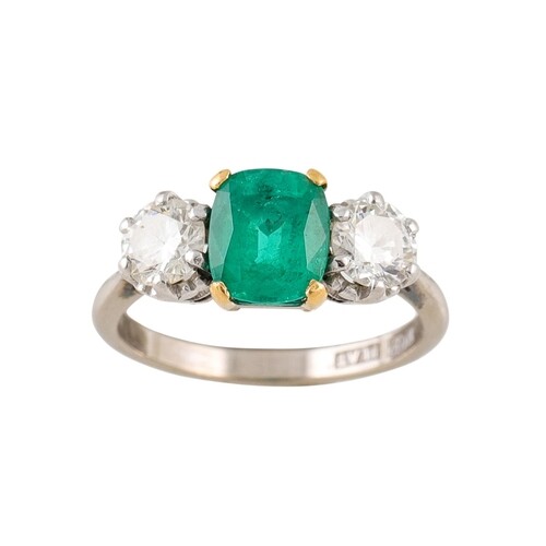 AN EMERALD AND DIAMOND THREE STONE RING, mounted in 18ct gol...