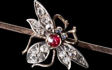 ANTIQUE VICTORIAN DIAMOND AND RUBY FLY BAR BROOCH. Bright an...